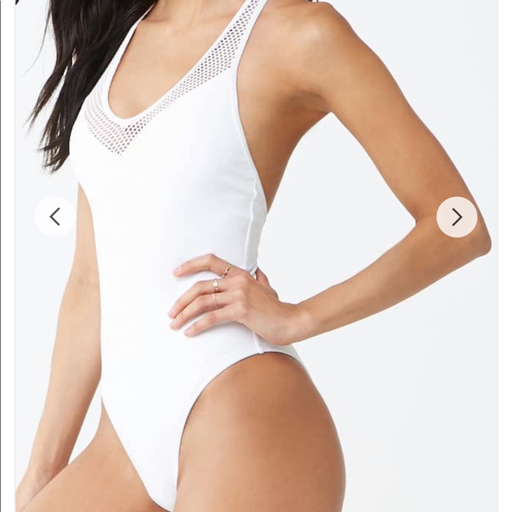 White one piece swimsuit.